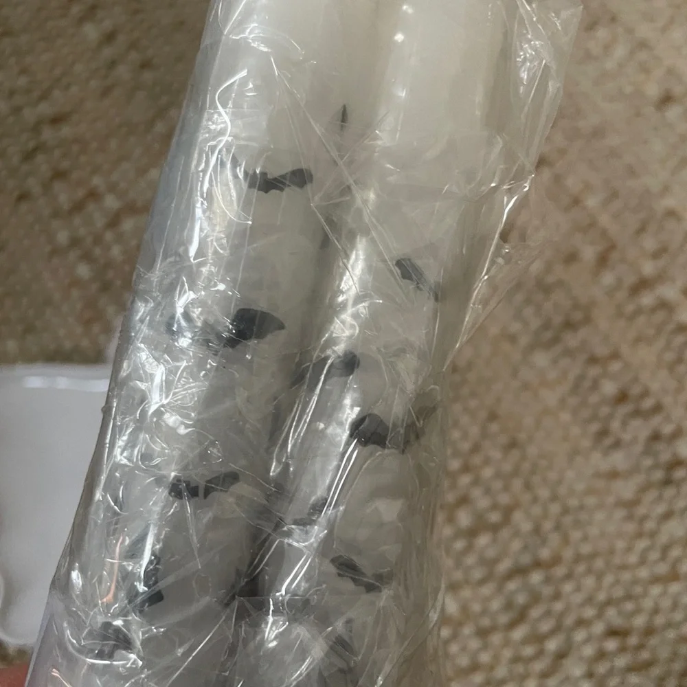 Ghost Shaped White Plates and 3- 10 inch high white candlesticks with black bats